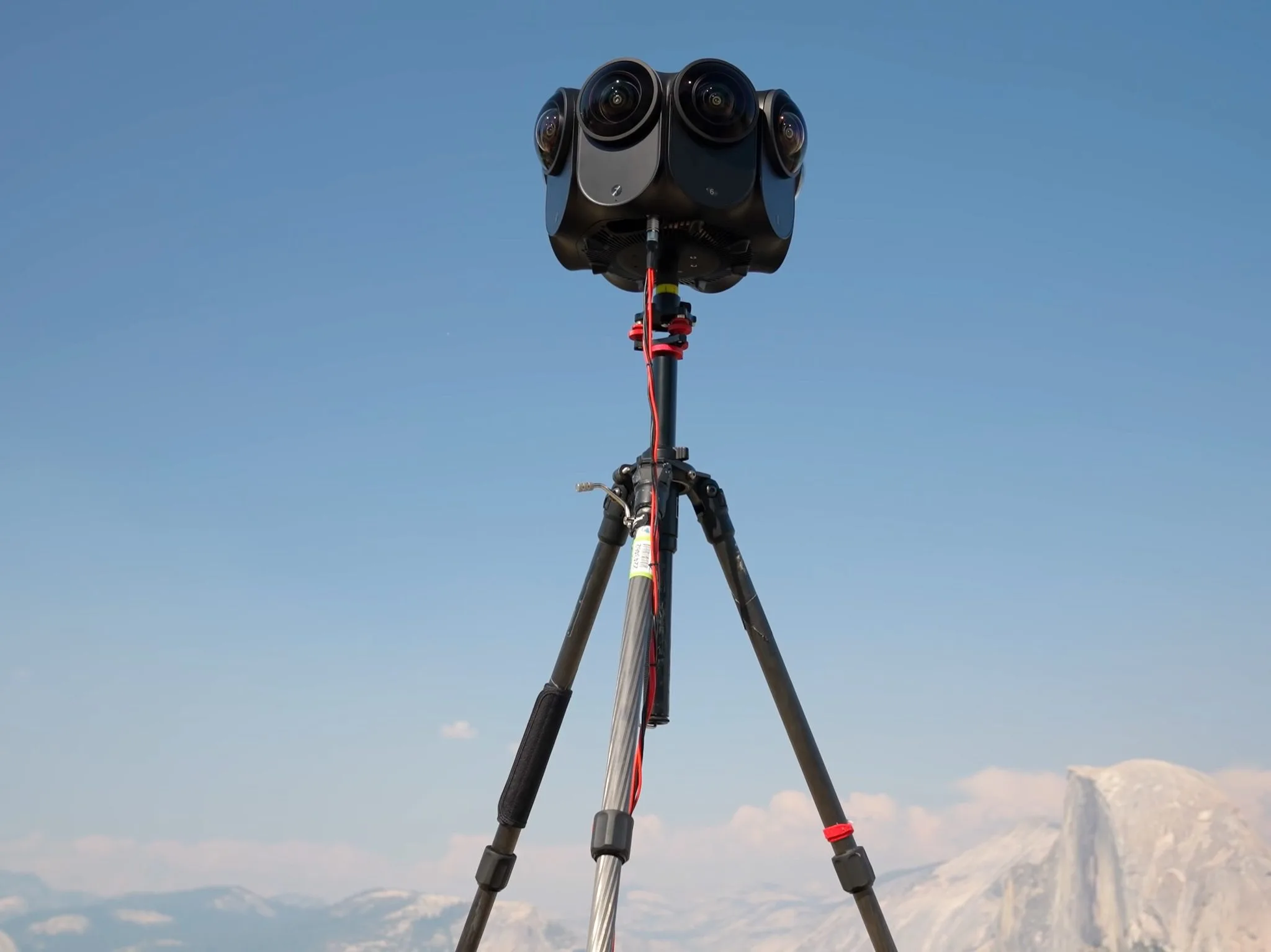 Obsidian Pro on a tripod outdoors on a mountain summit